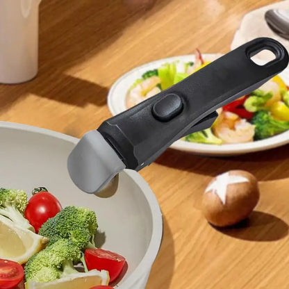 Cabo removível e anti-queimadura para panelas e frigideiras. Compatível com qualquer tipo de cookware, oferece segurança e praticidade na cozinha.
