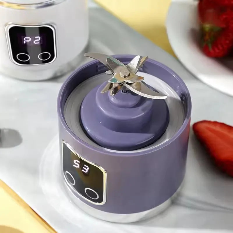 Espremedor elétrico portátil com carregamento USB, motor potente e capacidade de 450ml.