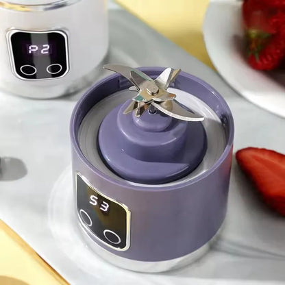 Espremedor elétrico portátil com carregamento USB, motor potente e capacidade de 450ml.