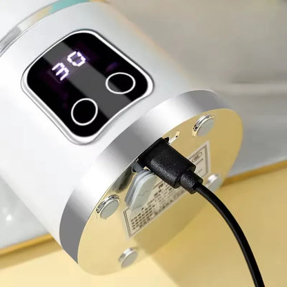 Espremedor elétrico portátil com carregamento USB, motor potente e capacidade de 450ml.